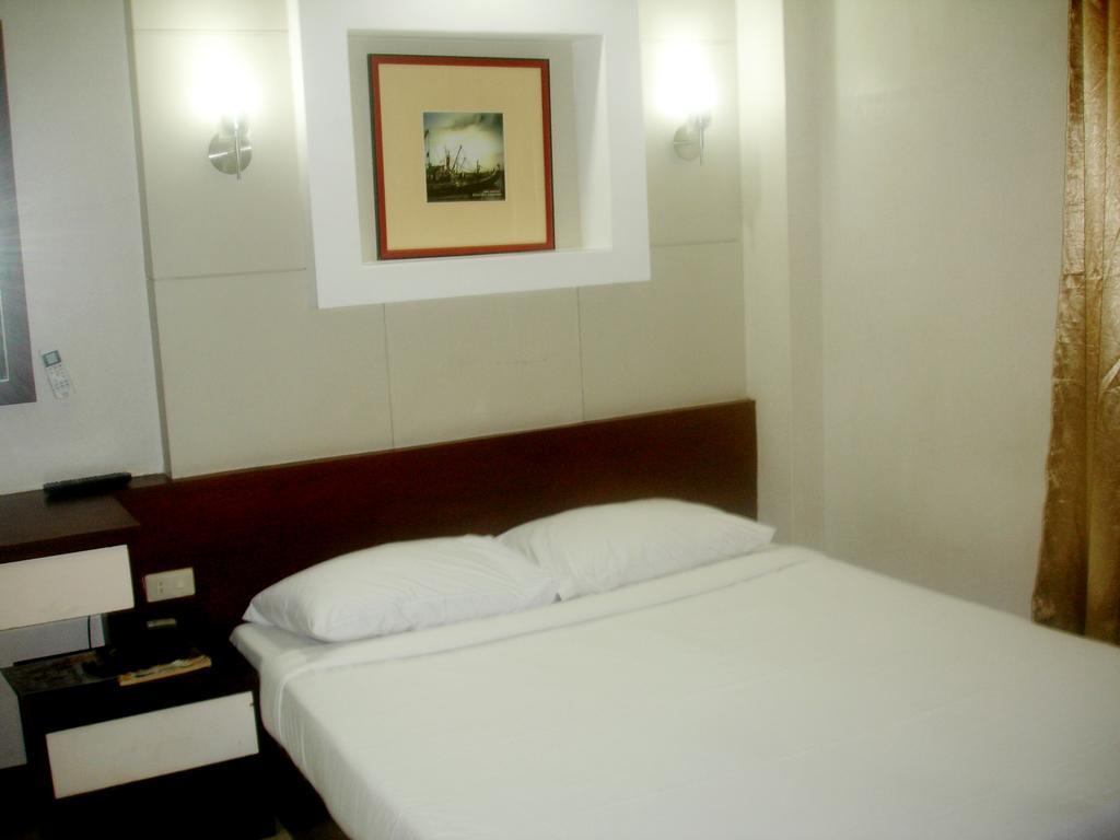 Roxas Midtown Hotel Habitación foto