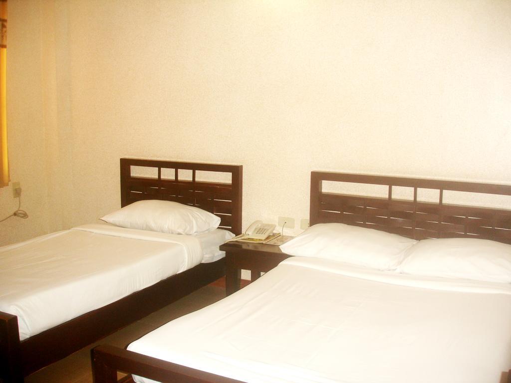 Roxas Midtown Hotel Habitación foto