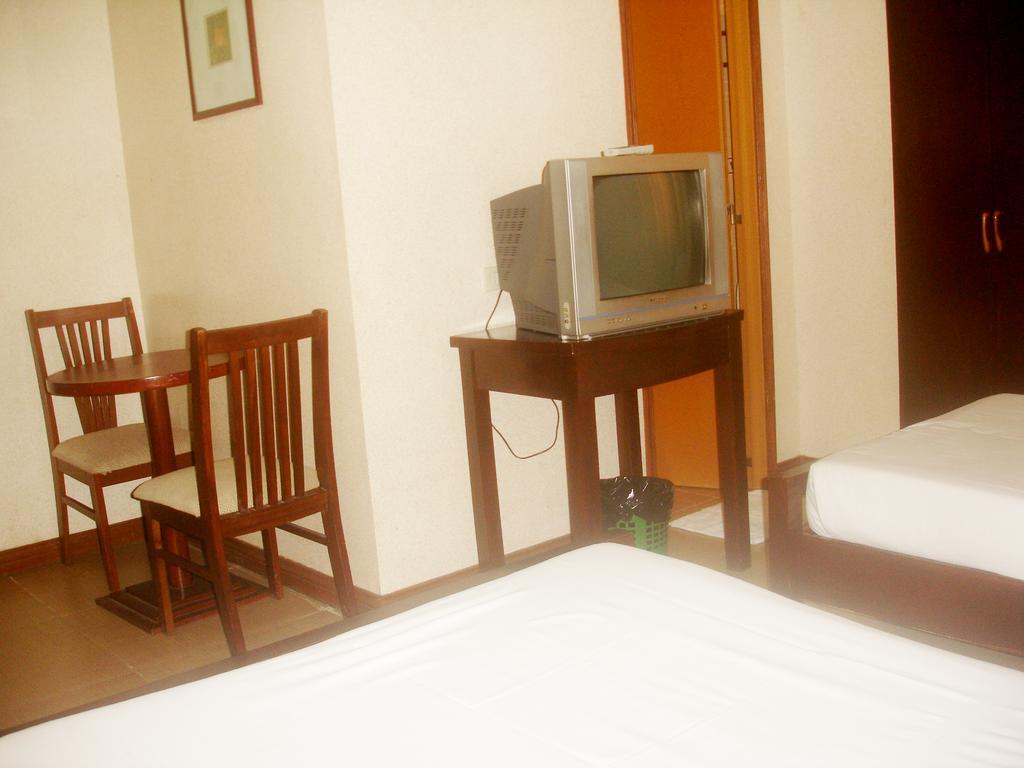 Roxas Midtown Hotel Habitación foto