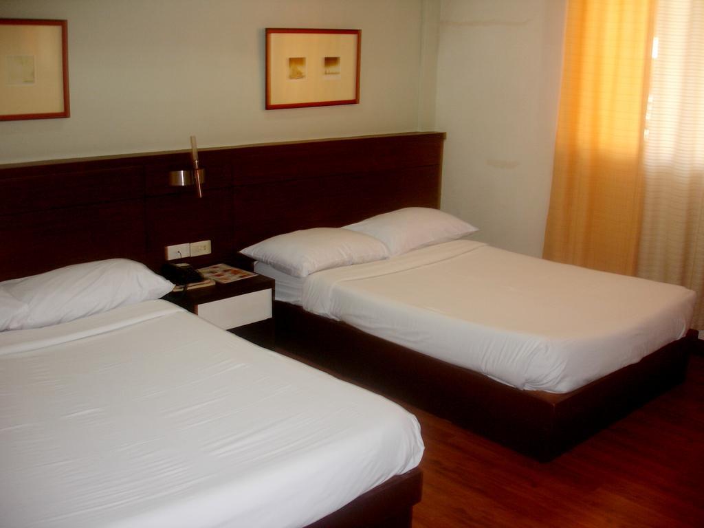 Roxas Midtown Hotel Habitación foto