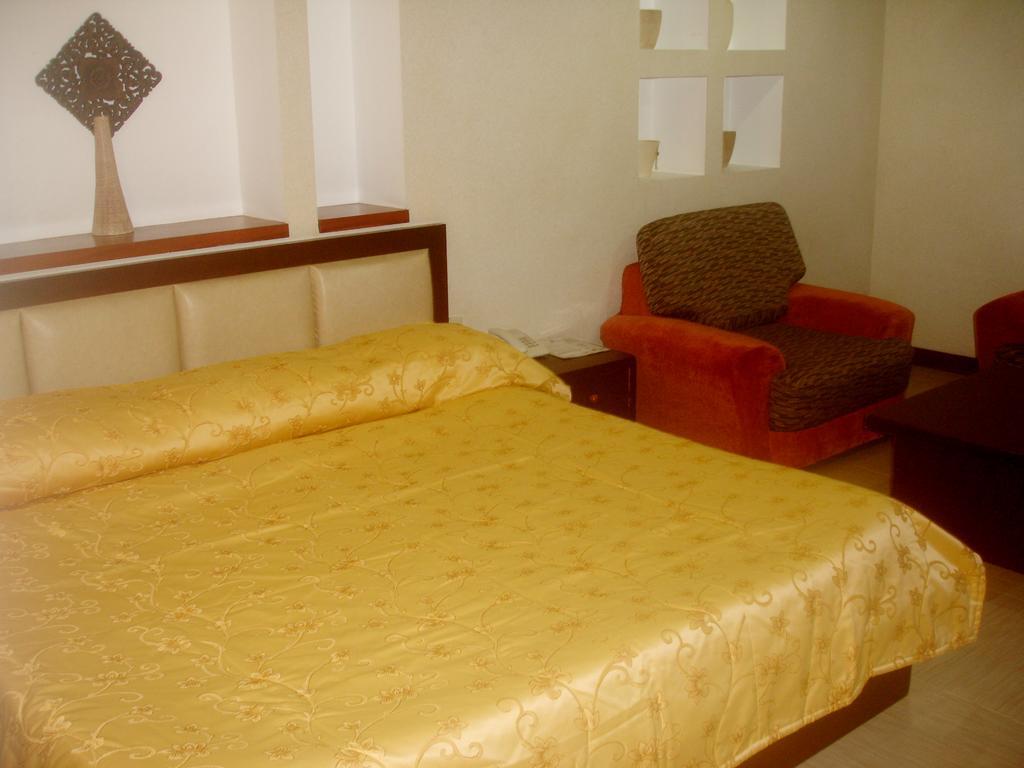 Roxas Midtown Hotel Habitación foto